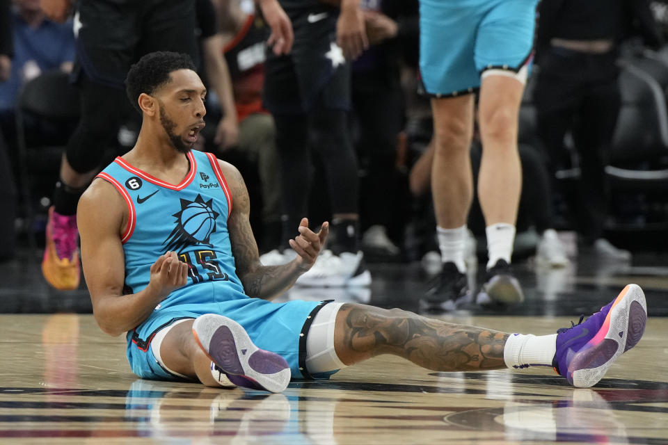 Phoenix Suns guard Cameron Payne (15) reacts after scoring a basket and getting fouled during the first half of an NBA basketball game against the Orlando Magic, Thursday, March 16, 2023, in Phoenix. (AP Photo/Rick Scuteri)