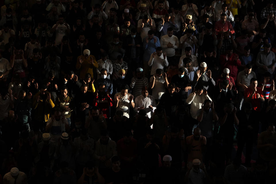 Muslim worshippers pray during Eid al-Fitr morning prayer at the Mohammad al-Amin Mosque in downtown of Beirut, Lebanon, Monday, May 2, 2022. (AP Photo/Hassan Ammar)