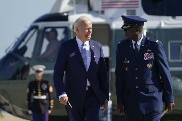 President Joe Biden is escorted by Commander of the 89th airlift wing Carlos Alford as he walks to board Air Force One at Andrews Air Force Base, Md., Saturday, June 25, 2022. Biden is traveling to Germany to attend a Group of Seven summit of leaders of the world's major industrialized nations. After the meeting in the Bavarian Alps, the president will go to Madrid on June 28 to participate in a gathering of NATO member countries. (AP Photo/Susan Walsh)