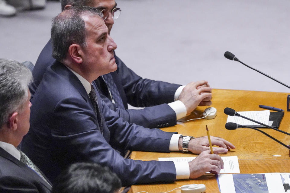 Azerbaijan's Foreign Minister Jeyhun Bayramov, center, listens during a United Nations Security Council meeting on the conflict between Armenia and Azerbaijan, Thursday Sept. 21, 2023 at U.N. headquarters. (AP Photo/Bebeto Matthews)