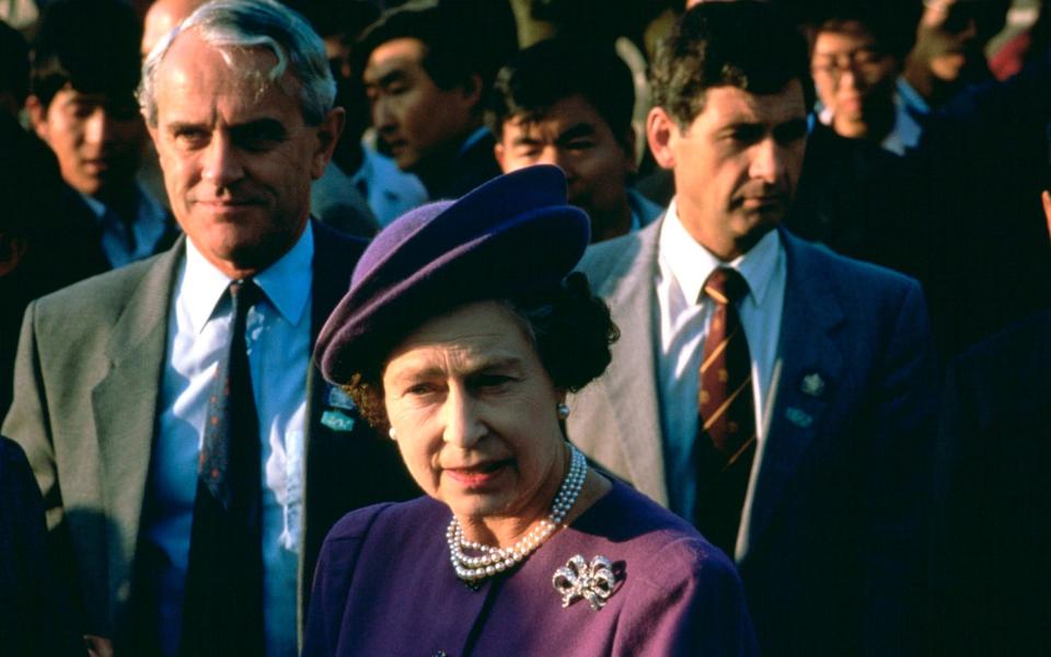 Her Majesty with Mr Shea, left - Getty