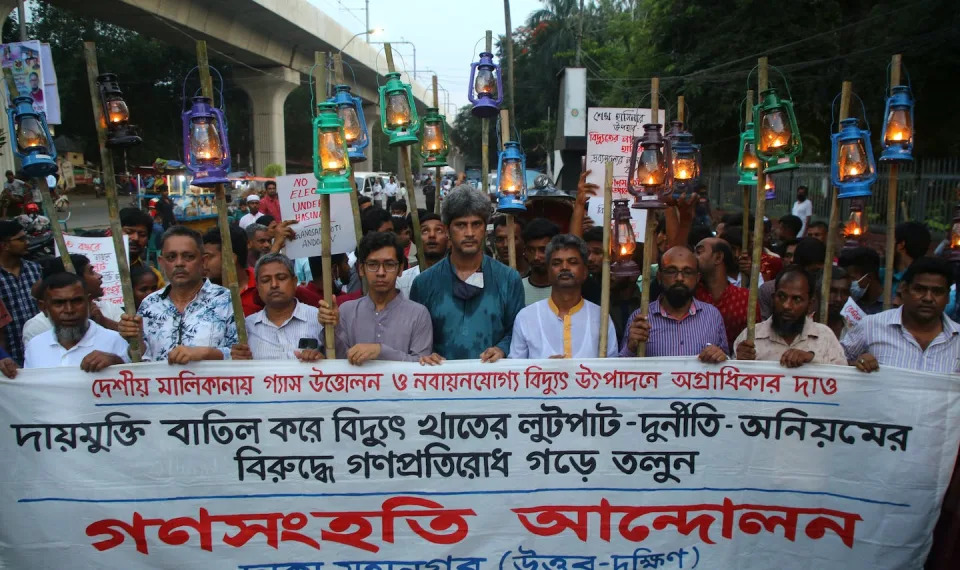 People protest in Dhaka, Bangladesh, over daily power cuts, July 27, 2022. <a href=