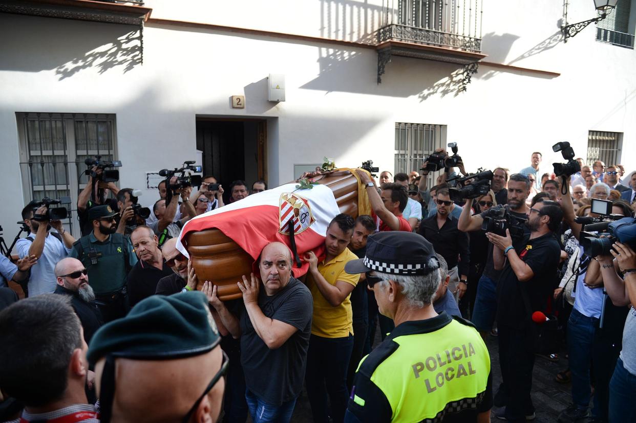 The coffin with the remains of Spanish football player Jose Antonio Reyes is carried on shoulders to the Santa Maria de Mesa church in Utrera, Seville during the funeral for the footballer on June 3, 2019. - Former Arsenal, Real Madrid and Spain forward, Jose Antonio Reyes, 35, was killed in a car crash on June 1, 2019. Reyes shot to fame at Sevilla and secured a switch to Arsenal, where he was part of the unbeaten 'Invincibles' 2003-2004 Premier League winners, before spells at Real and Atletico Madrid. (Photo by CRISTINA QUICLER / AFP)        (Photo credit should read CRISTINA QUICLER/AFP/Getty Images)