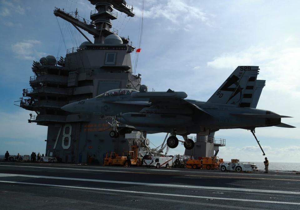 An EA-18G Growler, assigned to Air Test and Evaluation Squadron (VX) 23, prepares to land aboard USS Gerald R. Ford's (CVN 78) flight deck.