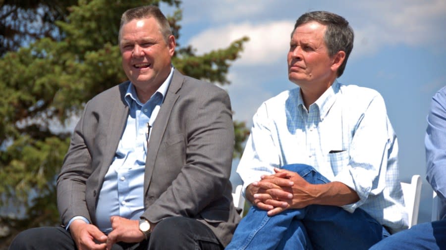 Montana Sens. Jon Tester (D), left, and Steve Daines (R) appear at a signing ceremony for two conservation agreements intended to protect elk and trout habitat just outside Yellowstone National Park, Thursday, Aug. 17, 2017 in Jardine, Mont.<em> (AP Photo/Matthew Brown)</em>