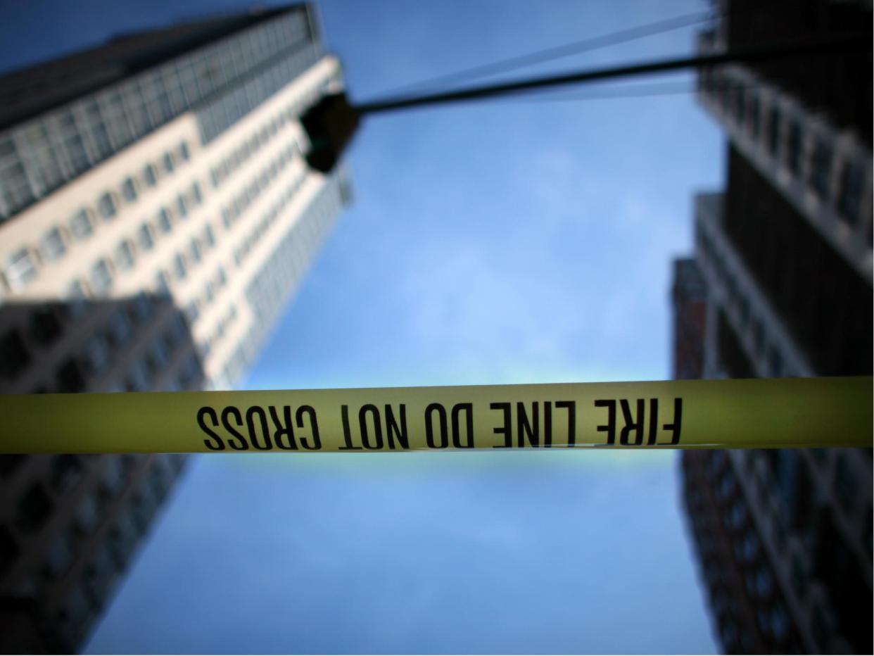 FDNY has cordoned off the sidewalk near a building where a piece of fire escape fell and killed a man: Yana Paskova/Getty Images