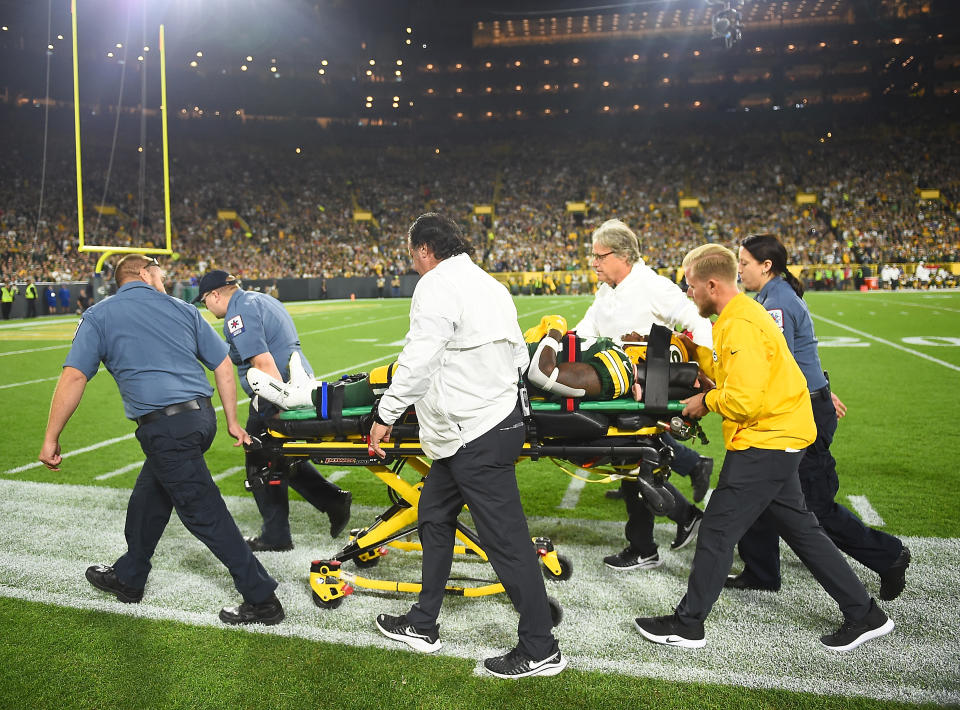 Running back Jamaal Williams of the Green Bay Packers had to be taken out on a stretcher after a helmet-to-helmet from Philadelphia Eagles' DE Derek Barnett on Thursday night. (Getty Images)