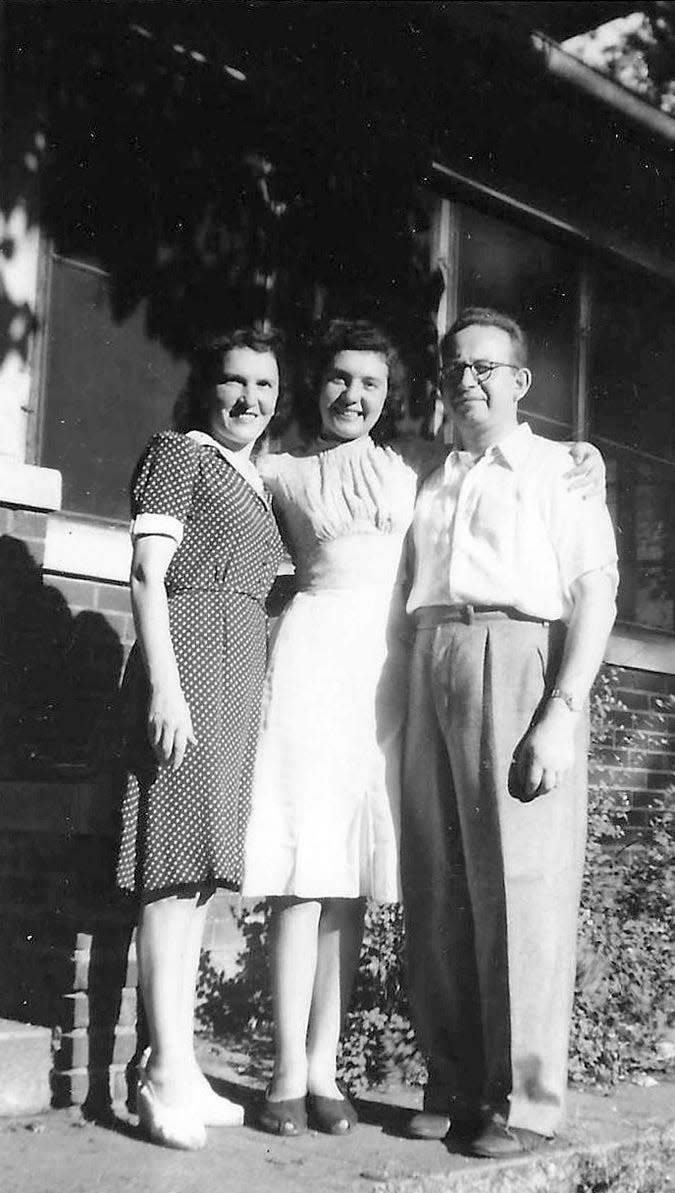 Celina Karp Biniaz, with her parents, Phyllis and Irwin Karp, in Des Moines about 1950.