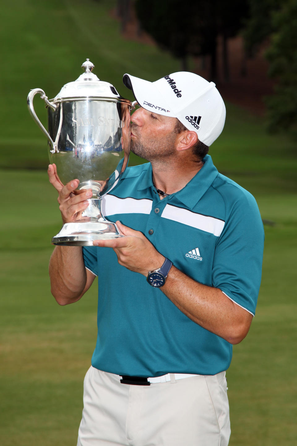 GREENSBORO, NC - AUGUST 20: Sergio Garcia of Spain holds the Sam Snead Cup after winning the Wyndham Championship at Sedgefield Country Club on August 20, 2012 in Greensboro, North Carolina. (Photo by Hunter Martin/Getty Images)