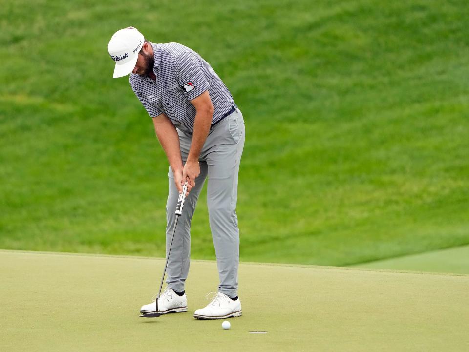 Jun 2, 2022; Dublin, Ohio, USA; Cameron Young makes a birdie putt on the 18th hole during Round 1 of the Memorial Tournament at Muirfield Village Golf Club in Dublin, Ohio on June 2, 2022. 