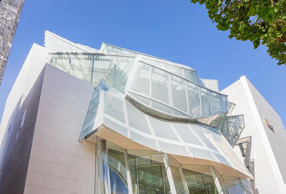 Another view of Gehry’s dramatic curved-glass façade panels.