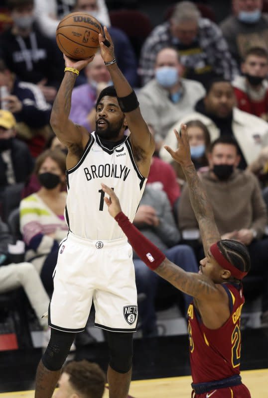 Brooklyn Nets Kyrie Irving shoots at Rocket Mortgage Field House in Cleveland on January 17, 2022. The basketball player turns 32 on March 23. File Photo by Aaron Josefczyk/UPI