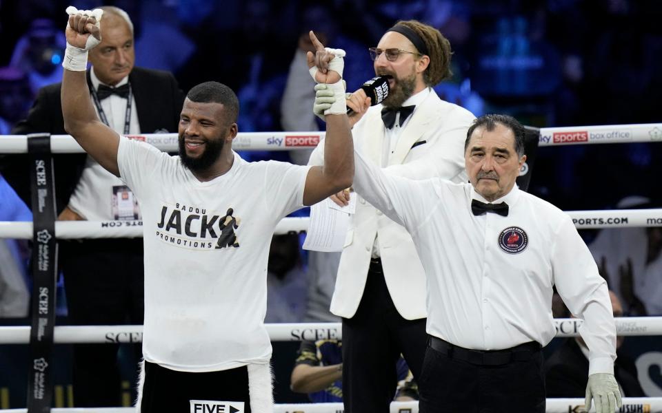 Sweden's Badou Jack, left, celebrates after beating Richard Rivera of the United States in a cruiserweight - AP
