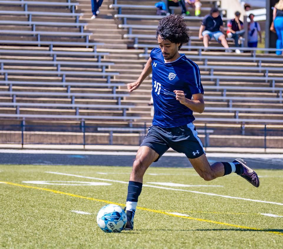 LASA Raptors Yohannes Heineman (10) warms up with practice kicks to the net before the game against the Northeast Raiders at the District 24-5A boys soccer game on Saturday, Mar 3, 2024, at Nelson Field in Austin, Texas.