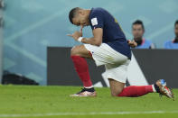 France's Kylian Mbappe celebrates after scoring his side's second goal during the World Cup round of 16 soccer match between France and Poland, at the Al Thumama Stadium in Doha, Qatar, Sunday, Dec. 4, 2022. (AP Photo/Ricardo Mazalan)