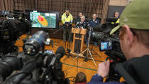 Ohio Governor Mike DeWine meets with reporters after touring the Norfolk and Southern train derailment site in East Palestine, Ohio, Monday, Feb. 6, 2023. Authorities in Ohio say they plan to release toxic chemicals from five cars of a derailed train in Ohio to reduce the threat of an explosion. (AP Photo/Gene J. Puskar)