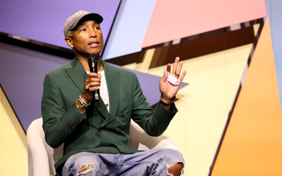 Pharrell Williams rocking preppy essentials last November