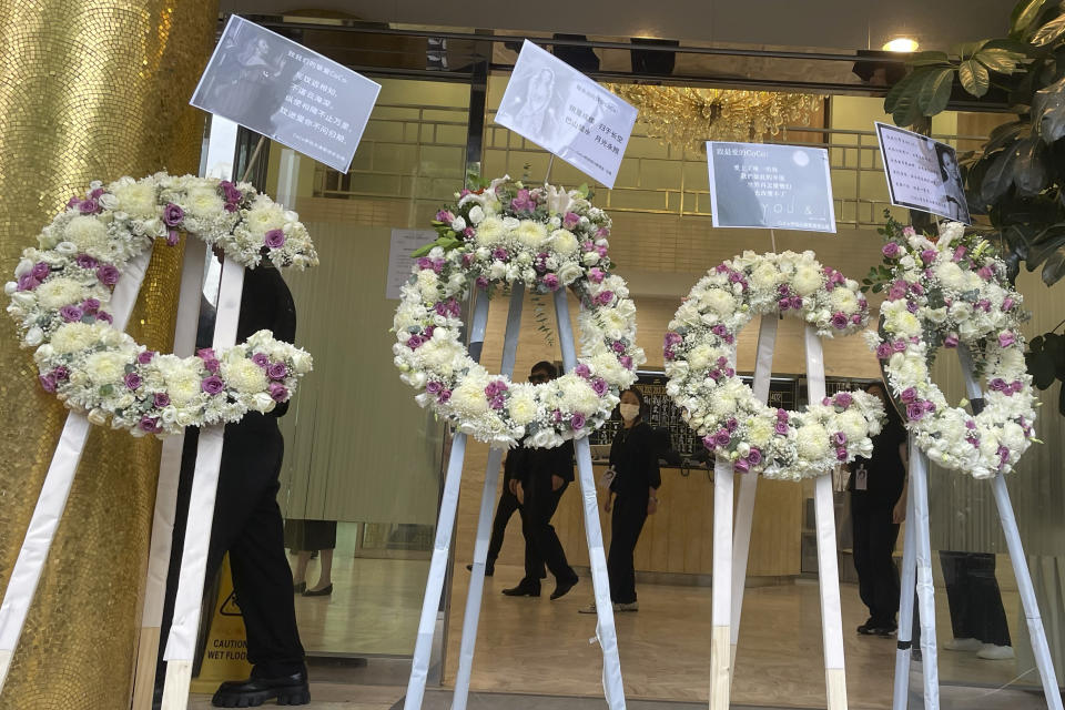 Wreaths are laid out at the Hong Kong Funeral Home, where a funeral is set up for Hong Kong singer and songwriter Coco Lee, in Hong Kong on Monday, July 31, 2023. Fans of singer and songwriter Coco Lee, who was known for her powerful voice and live performances, were gathering with flowers to pay their respects at her funeral in Hong Kong. (AP Photo/Annie Cheung)