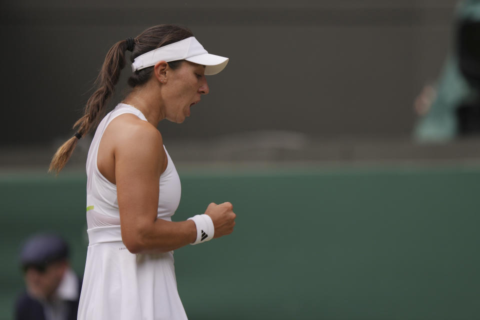 Jessica Pegula of the US celebrates a point against Czech Republic's Marketa Vondrousova during their women's singles match on day nine of the Wimbledon tennis championships in London, Tuesday, July 11, 2023. (AP Photo/Alberto Pezzali)