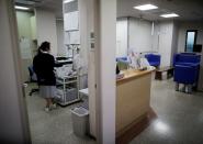 A staff member is seen at an urology clinic in Urawa