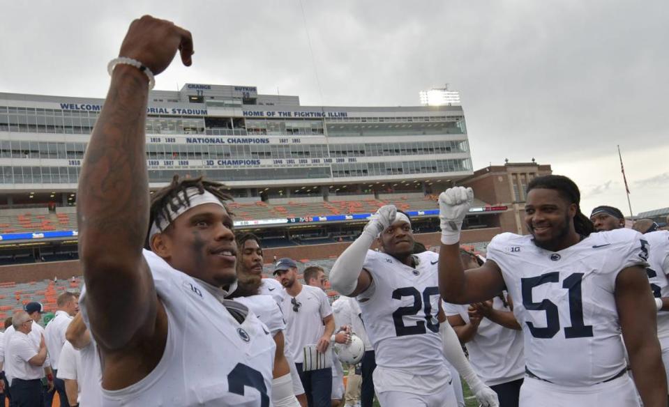 The Penn State Nittany Lions celebrate their 30-13 win Saturday over Illinois at Memorial Stadium in Champaign, Illinois.