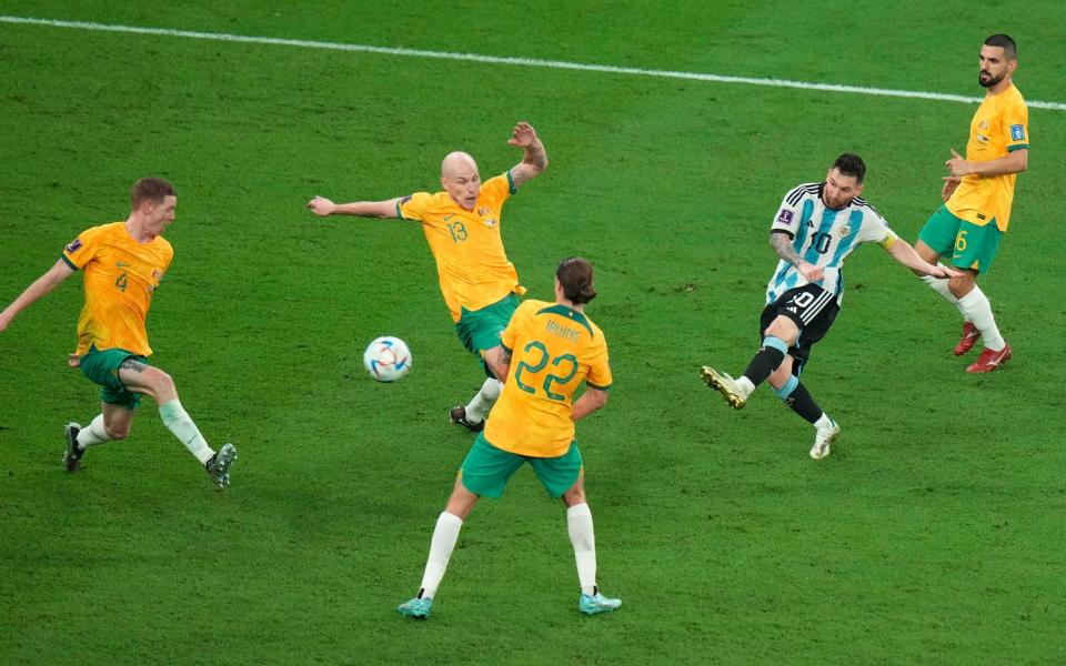 Argentina's Lionel Messi makes an attempt to score during the World Cup round of 16 soccer match between Argentina and Australia at the Ahmad Bin Ali Stadium - AP