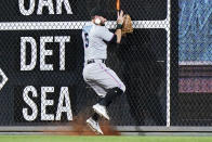 Miami Marlins outfielder Jon Berti cannot catch run-scoring double by Philadelphia Phillies' Alec Bohm during the eighth inning of a baseball game, Tuesday, May 18, 2021, in Philadelphia. (AP Photo/Matt Slocum)
