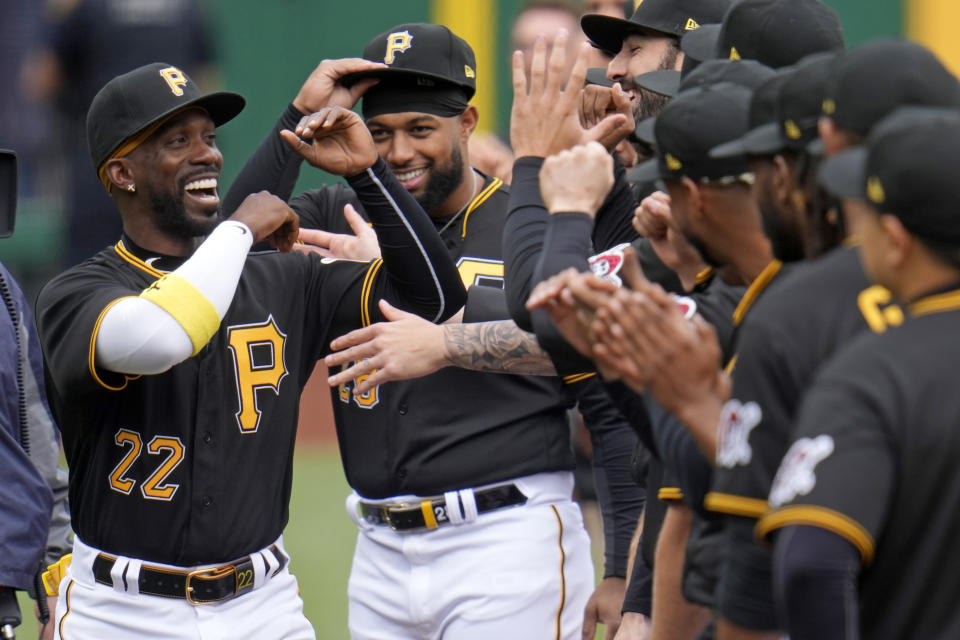 Pittsburgh Pirates' Andrew McCutchen (22) is introduced before the Pirates home opener baseball game against the Chicago White Sox in Pittsburgh, Friday, April, 7, 2023. (AP Photo/Gene J. Puskar)