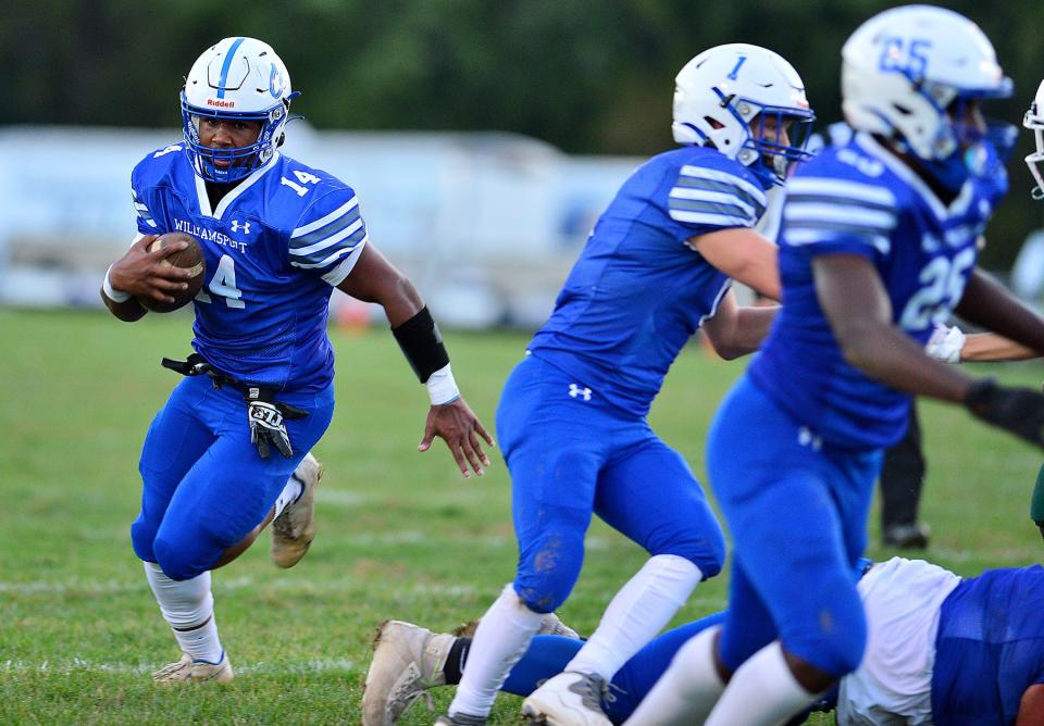 Williamsport's Corry Nelson (14) gave the Wildcats a needed lift when he filled in at quarterback against South Hagerstown. He gave Williamsport what it wanted, but Cole Rourke provided what it needed for the 21-7 victory.