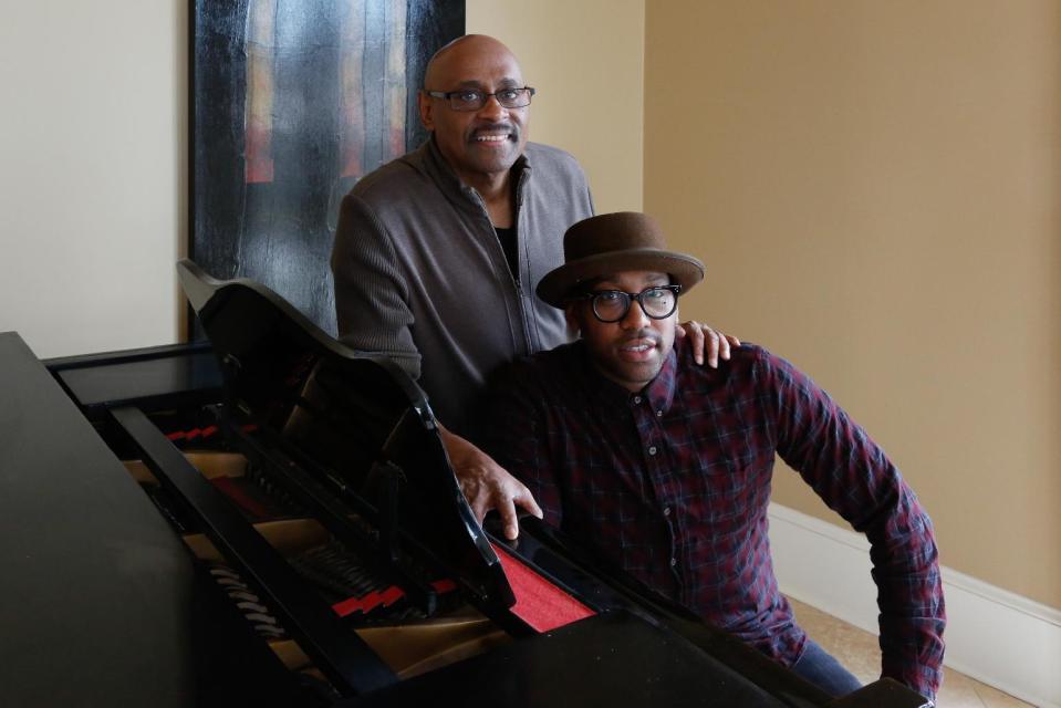 This Dec. 26, 2013 photo shows Bishop Paul Morton, left, and his son PJ Morton in New Orleans. The Mortons are nominated for best gospel album for “Best Days Yet,” the elder Morton’s album where PJ wrote and produced four songs. PJ’s song, the Stevie Wonder-featured “Only One,” is also up for best R&B song. The Mortons are the first to accomplish the feat since Bob and Jakob Dylan did so in 1998. (AP Photo/Doug Parker)