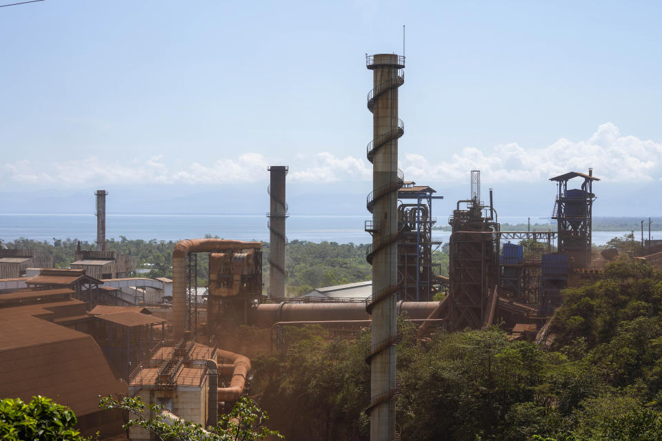 The nickel mine run by the Swiss-based Solway Investment Group stands next to Izabal Lake in El Estor in the northern coastal province of Izabal, Guatemala, Monday, Oct. 25, 2021. The Guatemalan government has declared a month-long, dawn-to-dusk curfew and banned pubic gatherings following protests against this mine. (AP Photo/Moises Castillo)