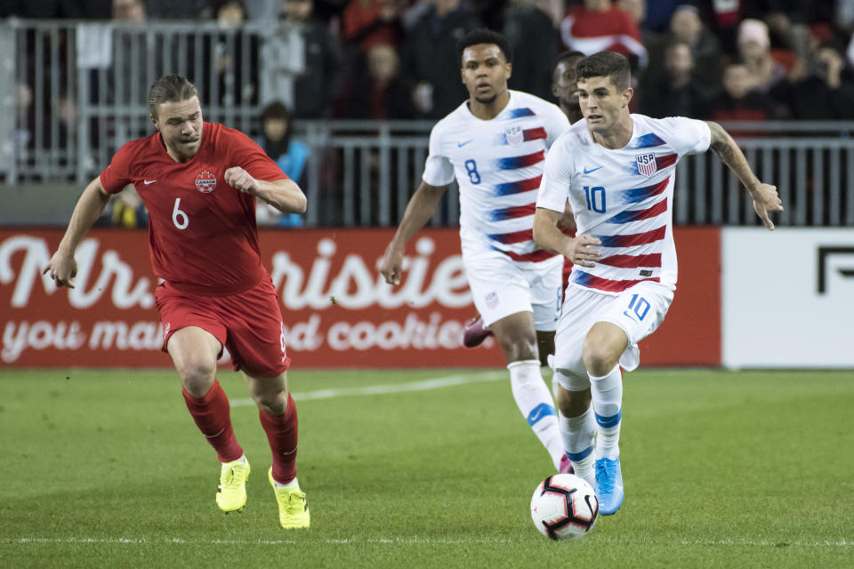 TORONTO, CANADA - 2019/10/15: Christian Pulisic (10) and Samuel Piette (6) are seen in action during the Nations League qualifier game between Canada and USA at Bmo field in Toronto. (Final score; Canada 2:0 USA). (Photo by Angel Marchini/SOPA Images/LightRocket via Getty Images)