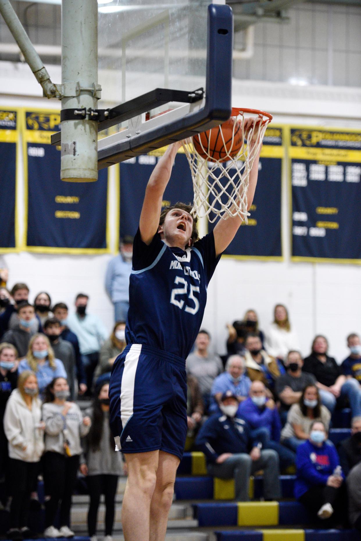Morris Catholic boys basketball at Pequannock on Thursday, February 10, 2022. MC #25 Michelangelo Oberti drives to the basket in the second period. 