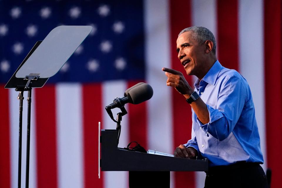 Former President Barack Obama speaks at Citizens Bank Park as he campaigns for Democratic presidential candidate former Vice President Joe Biden in Philadelphia on 21 October. (AP)