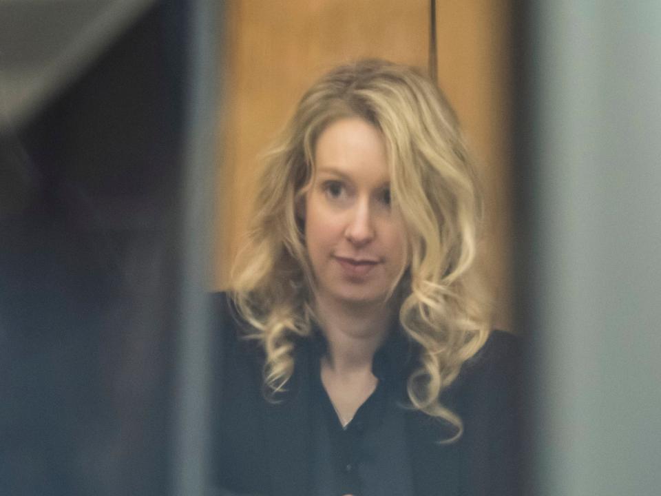 Elizabeth Holmes sitting in court.