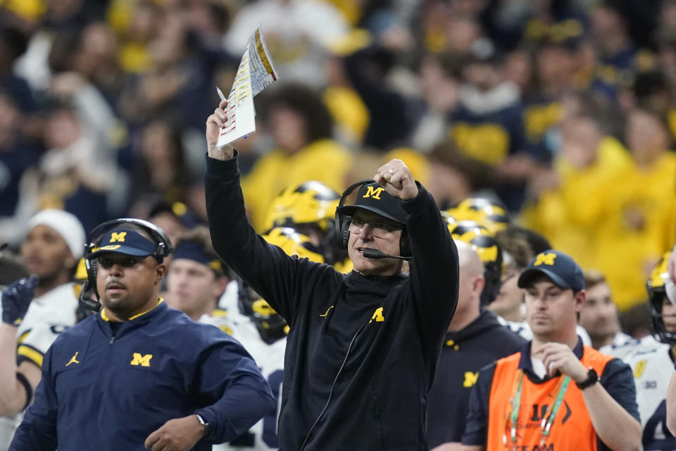 Michigan head coach Jim Harbaugh reacts on the sideline during the second half of the Big Ten championship NCAA college football game against Iowa, Saturday, Dec. 4, 2021, in Indianapolis. Michigan won 42-3. (AP Photo/Darron Cummings)