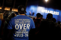 Leicester City fans celebrate outside the King Power stadium after their team won the Premier League title in Leicester, Britain May 3, 2016. REUTERS/Eddie Keogh