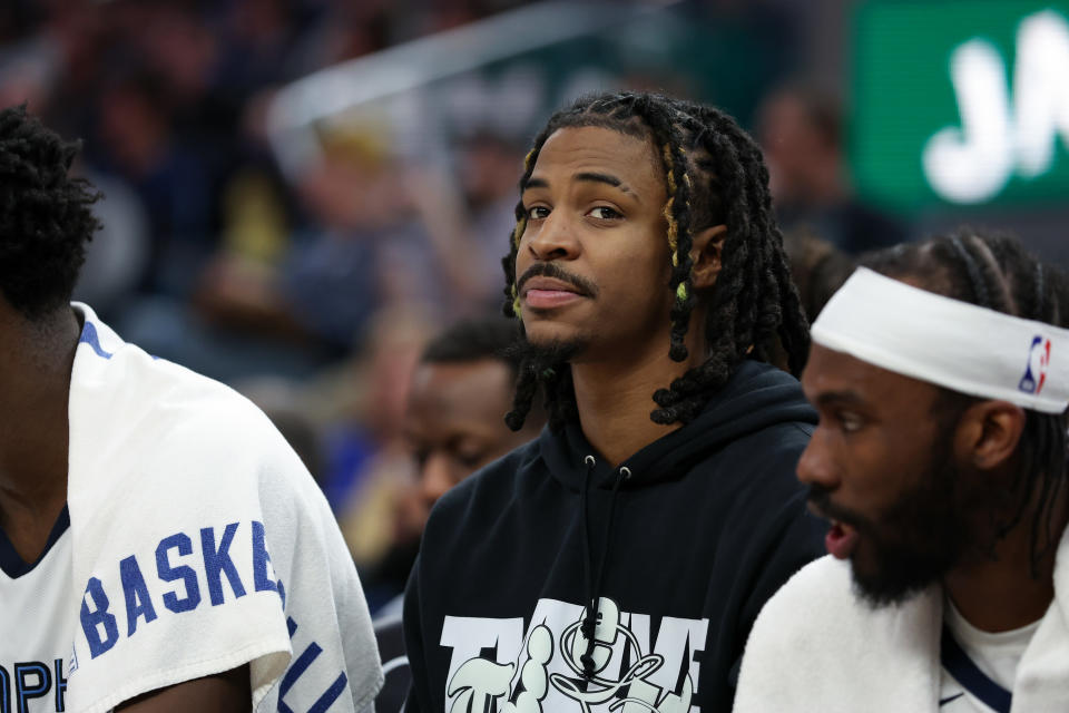 SAN FRANCISCO, CALIFORNIA - MARCH 20: Ja Morant #12 of the Memphis Grizzlies sits on the bench during their game against the Golden State Warriors in the first half at Chase Center on March 20, 2024 in San Francisco, California. NOTE TO USER: User expressly acknowledges and agrees that, by downloading and or using this photograph, User is consenting to the terms and conditions of the Getty Images License Agreement. (Photo by Ezra Shaw/Getty Images)