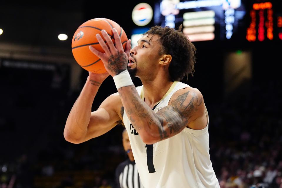 Dec 29, 2023; Boulder, Colorado, USA; Colorado Buffaloes guard J'Vonne Hadley (1) prepares to shoot the ball in the second half against the Washington Huskies at the CU Events Center. Mandatory Credit: Ron Chenoy-USA TODAY Sports