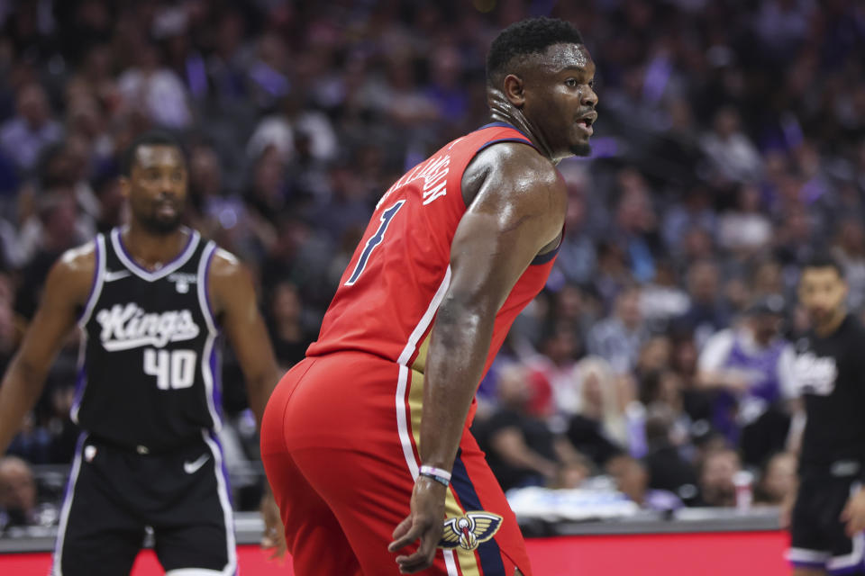 New Orleans Pelicans forward Zion Williamson (1) defends against the Sacramento Kings during the first half of an NBA basketball game Thursday, April 11, 2024, in Sacramento, Calif. (AP Photo/Benjamin Fanjoy)
