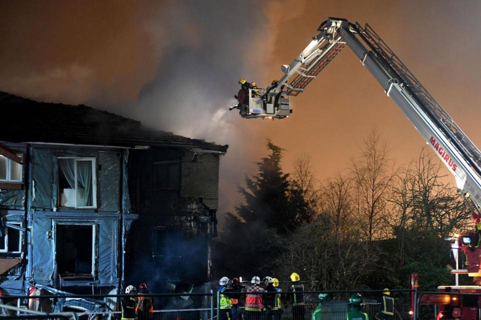 Rescue effort: More than 70 firefighters were called to the flats in Hornchurch (PA)