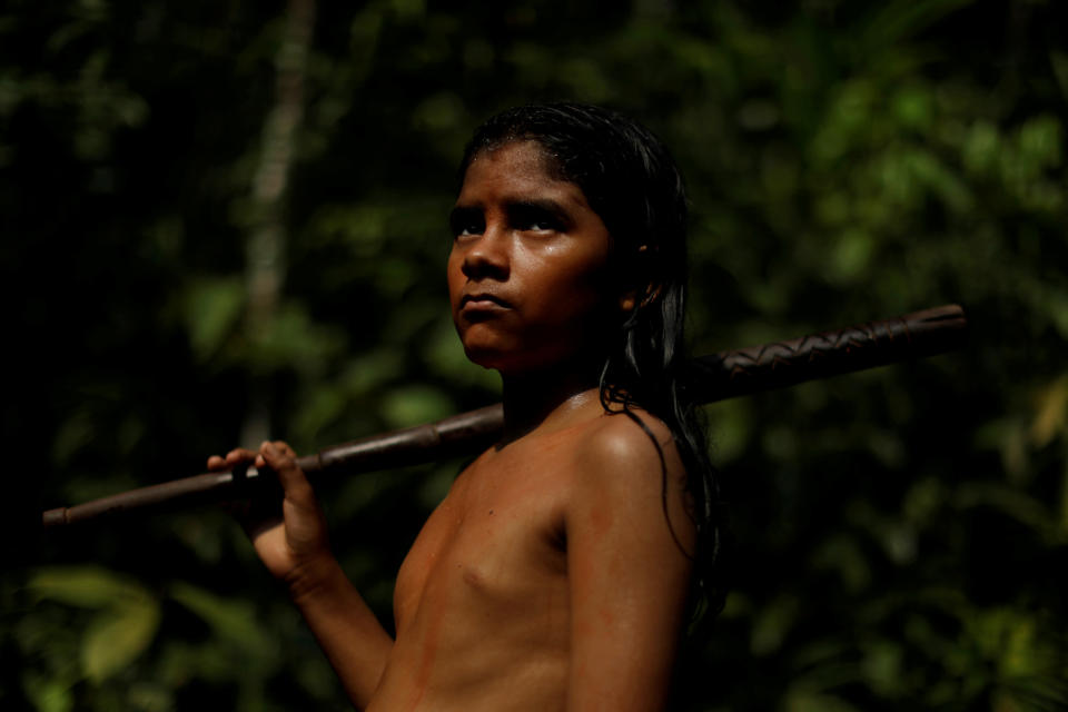 REFILE - REMOVING EXTRA CHARACTERS  An indigenous named Pedro Mura from the Mura tribe reacts in front a deforested area in nondemarcated indigenous land inside the Amazon rainforest near Humaita, Amazonas State, Brazil August 20, 2019. Picture taken August 20, 2019. REUTERS/Ueslei Marcelino