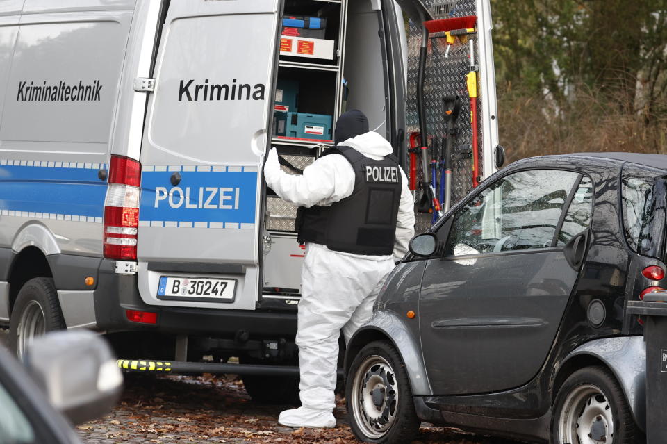 A police officer works during a raid in Berlin, Germany, December 7, 2022. Twenty-five suspects were arrested after coordinated raids in 11 federal states, including Thuringia, Hesse and Lower Saxony, the Federal Prosecutor's Office said in a statement. / Credit: Abdulhamid Hosbas/Anadolu Agency/Getty