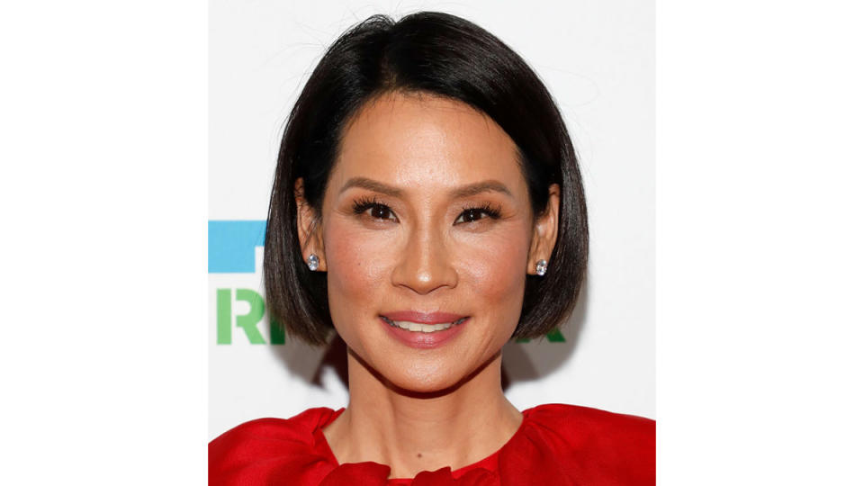 Lucy Liu with false eyelashes