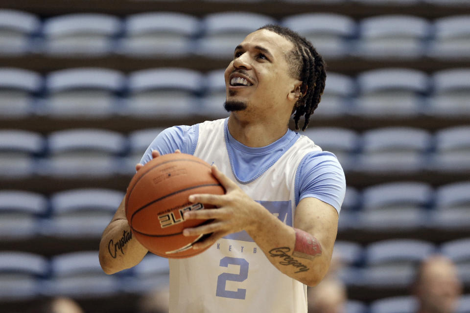 In this photo taken Wednesday, Oct. 2, 2019, North Carolina's Cole Anthony shoots during an NCAA college basketball practice in Chapel Hill, N.C. The freshman is expected to play a major role for the Tar Heels at the point. (AP Photo/Gerry Broome)