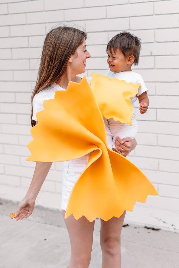 <p>Celebrate Halloween with this mommy-and-me <a href="https://studiodiy.com/diy-pasta-costume/" rel="nofollow noopener" target="_blank" data-ylk="slk:DIY pasta costume;elm:context_link;itc:0;sec:content-canvas" class="link ">DIY pasta costume</a>. You'll flip for this farfalle and ravioli look. Your little meatball will love it too.<br></p>