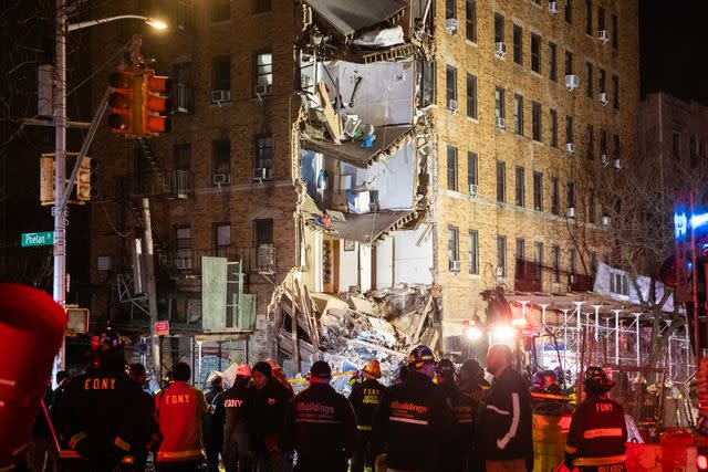 <p>Liao Pan/China News Service/VCG via Getty</p> Emergency responders at the partial building collapse in the Bronx