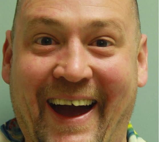 Few people posing for a mug shot have the sunny disposition shown by David Kalb. The 41-year-old resident of Greensburg, Pennsylvania, posed for this magical photo after state troopers discovered <a href="http://www.huffingtonpost.com/entry/david-kalb-cheerful-mug-shot_56685684e4b080eddf56631d?utm_hp_ref=mug-shots" target="_blank">70 psychedelic mushroom plants</a> and other drug paraphernalia inside his public housing apartment.