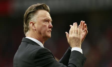 Football - Manchester United v Arsenal - Barclays Premier League - Old Trafford - 17/5/15 Manchester United manager Louis van Gaal applauds fans during a lap of honour after the game Action Images via Reuters / Jason Cairnduff Livepic