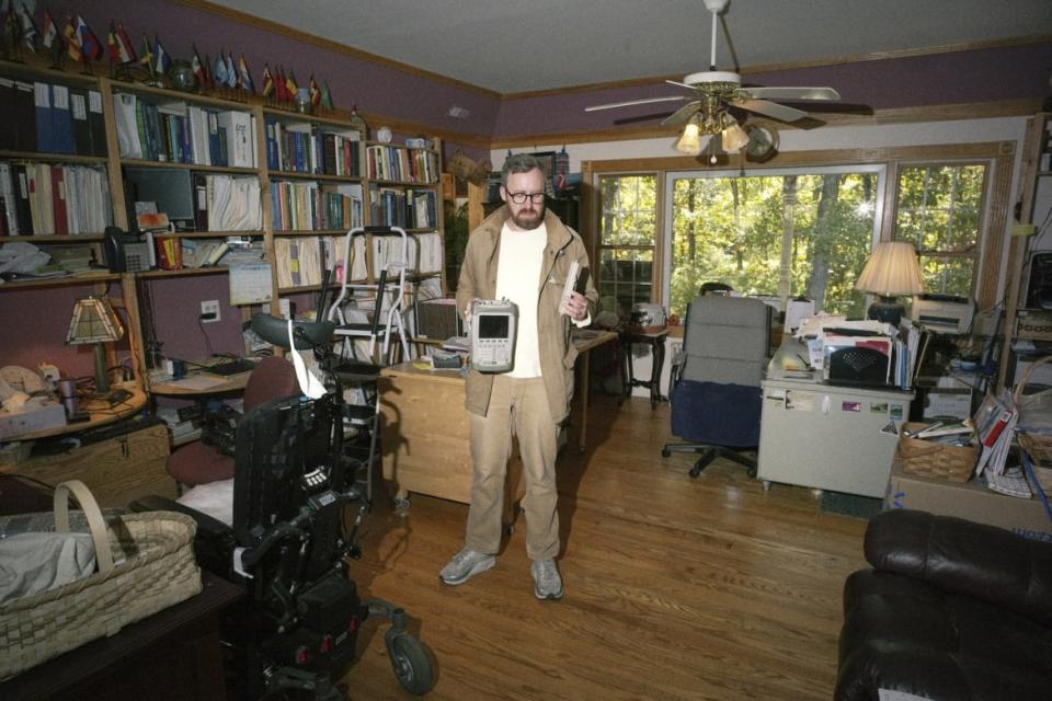 John Wilson stands inside a home in season 3 of How to With John Wilson.